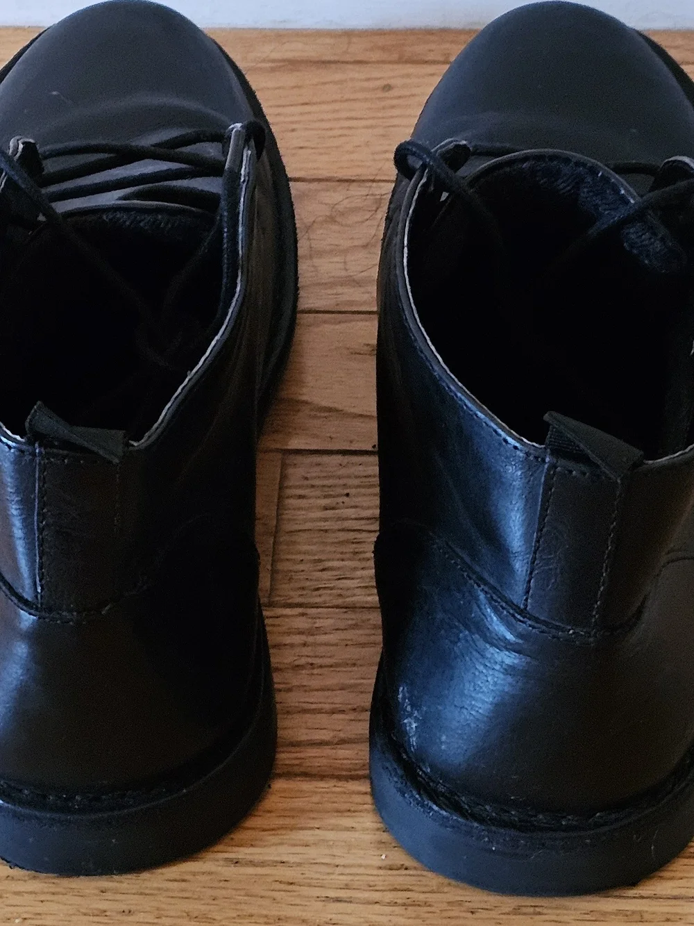 Men’s short dress boots.  Black leather.  Worn a couple of times Sz 9